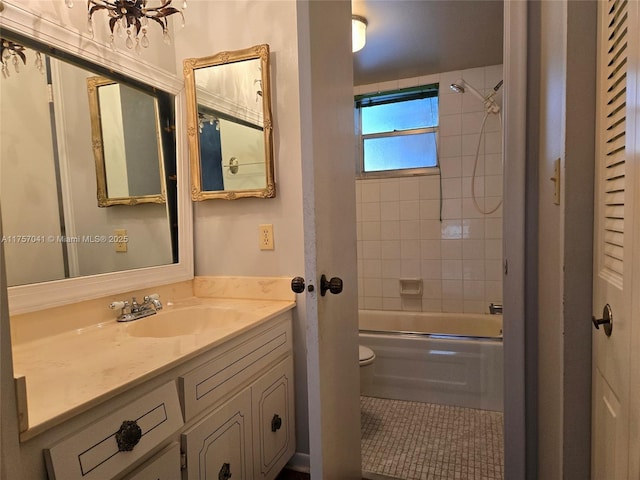 full bath featuring toilet, shower / washtub combination, tile patterned flooring, and vanity