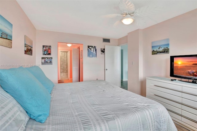 bedroom featuring visible vents and ceiling fan