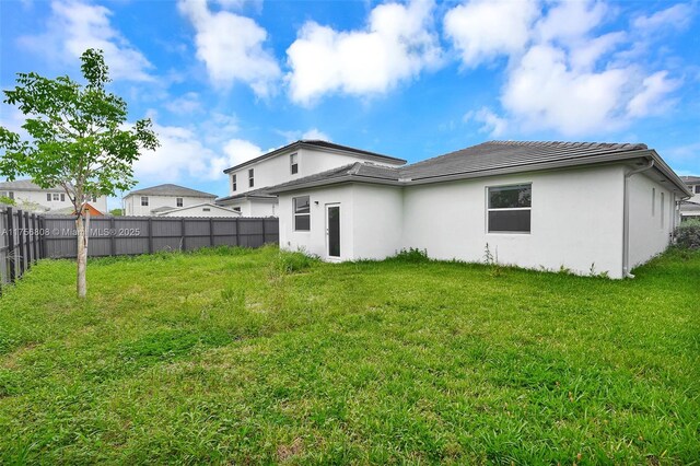 12735 SW 211th St, Miami, FL 33177 - rear view of property with a tile roof and stucco siding