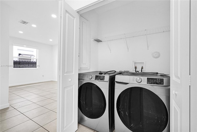 12735 SW 211th St, Miami, FL 33177 - laundry area with washing machine and dryer, light tile patterned floors, baseboards, and recessed lighting