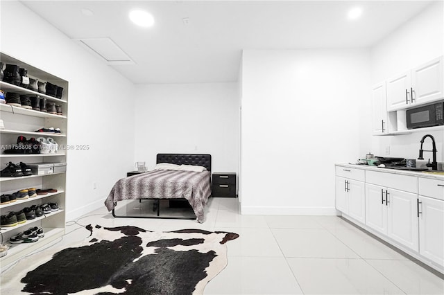 12735 SW 211th St, Miami, FL 33177 - bedroom featuring a sink, baseboards, attic access, recessed lighting, and light tile patterned floors