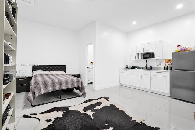 12735 SW 211th St, Miami, FL 33177 - bedroom featuring freestanding refrigerator, recessed lighting, baseboards, and connected bathroom