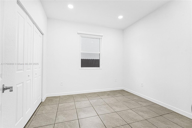 12735 SW 211th St, Miami, FL 33177 - unfurnished bedroom featuring light tile patterned floors, a closet, recessed lighting, and baseboards