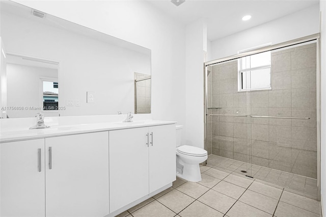 12735 SW 211th St, Miami, FL 33177 - bathroom featuring double vanity, a stall shower, toilet, tile patterned flooring, and recessed lighting