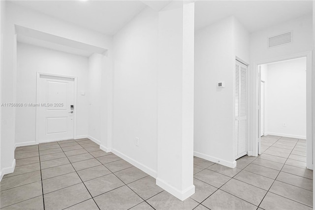 12735 SW 211th St, Miami, FL 33177 - hallway featuring light tile patterned floors and baseboards