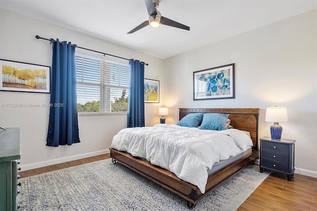 1835 N Dixie Hwy, Fort Lauderdale, FL 33305 - bedroom with wood finished floors, a ceiling fan, and baseboards