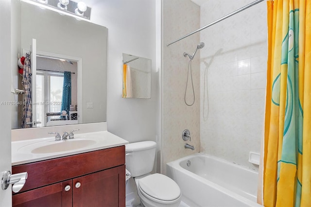 bathroom with toilet, shower / bath combo with shower curtain, and vanity