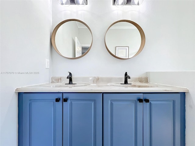 bathroom with a sink and double vanity