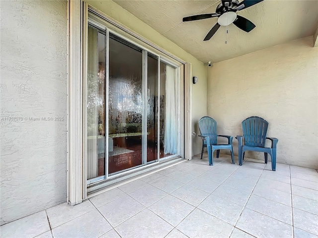 view of patio with ceiling fan