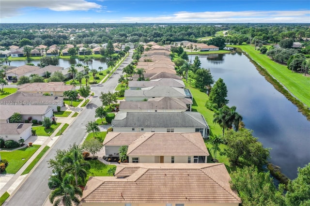 aerial view featuring a water view and a residential view