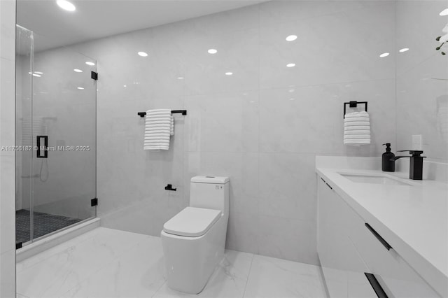 full bathroom with toilet, a shower stall, marble finish floor, and vanity