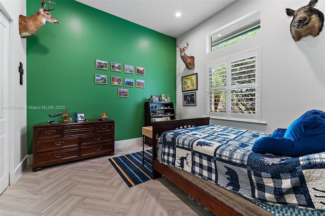 bedroom featuring baseboards and recessed lighting