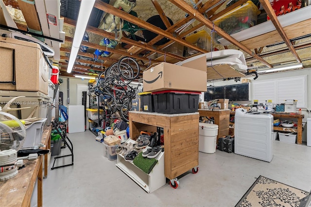 garage with a workshop area