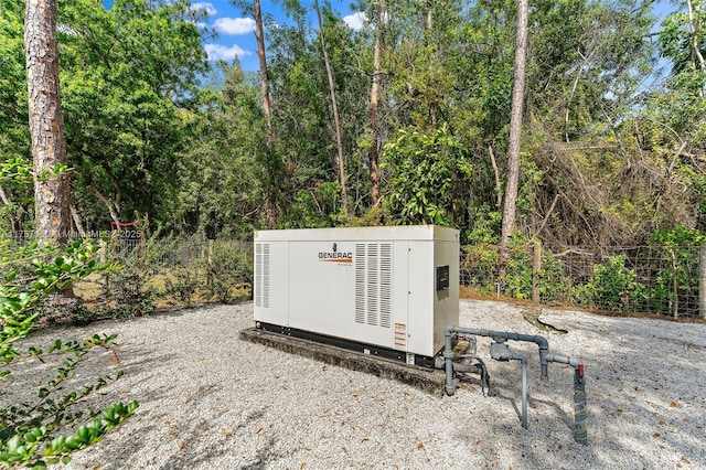 exterior details with a power unit and fence