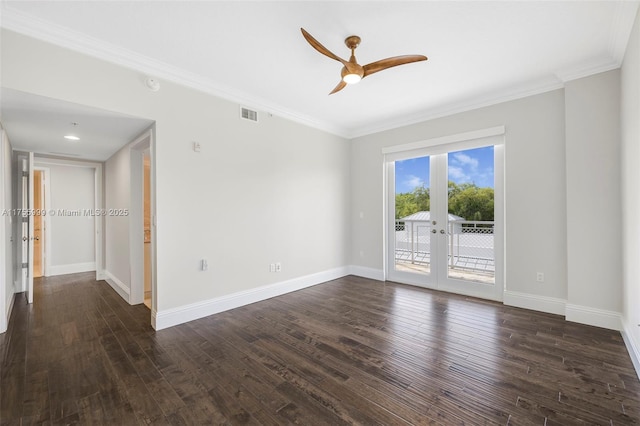 unfurnished room featuring crown molding, visible vents, baseboards, and dark wood-type flooring