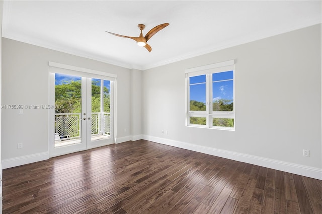 unfurnished room with ornamental molding, french doors, dark wood finished floors, and baseboards