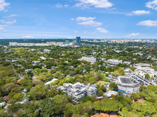 birds eye view of property featuring a city view