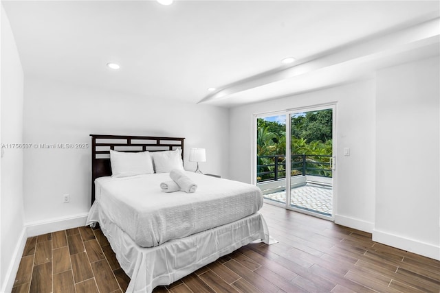 bedroom with access to exterior, wood tiled floor, baseboards, and recessed lighting