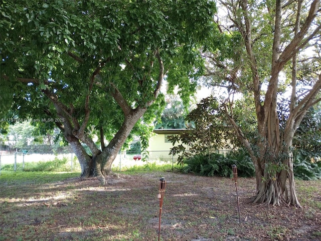 view of yard featuring fence