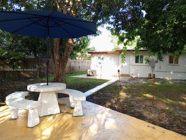 view of yard with a patio area and fence