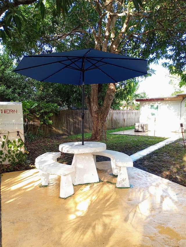 view of patio with fence