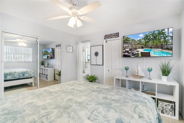 bedroom featuring ensuite bathroom, a closet, and a ceiling fan