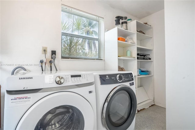 laundry area featuring laundry area and washer and clothes dryer