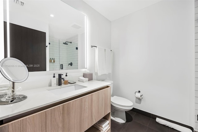 bathroom featuring toilet, a shower stall, visible vents, and tile patterned floors