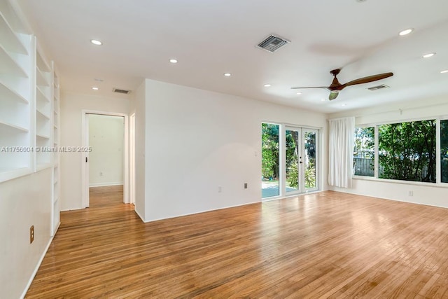 spare room featuring ceiling fan, recessed lighting, visible vents, and light wood-style floors