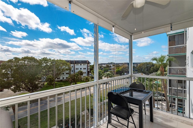 balcony featuring a ceiling fan