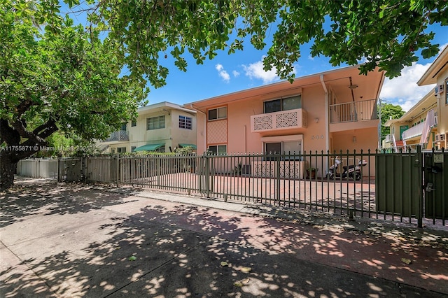 exterior space with fence and stucco siding