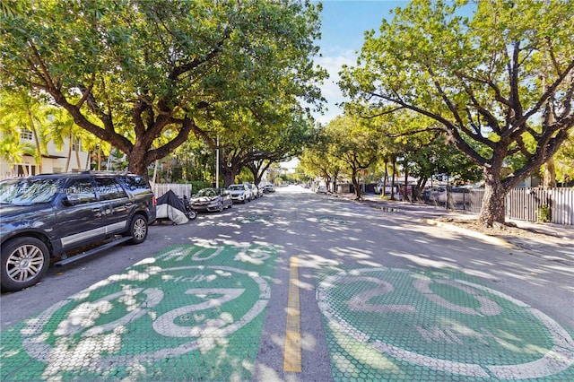 view of street with curbs