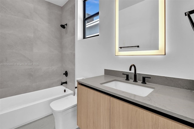 full bath featuring shower / bathing tub combination, vanity, and toilet