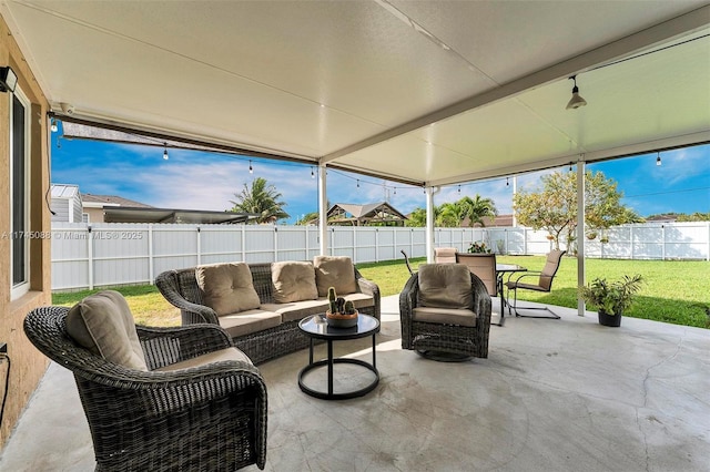 view of patio / terrace featuring a fenced backyard and an outdoor living space