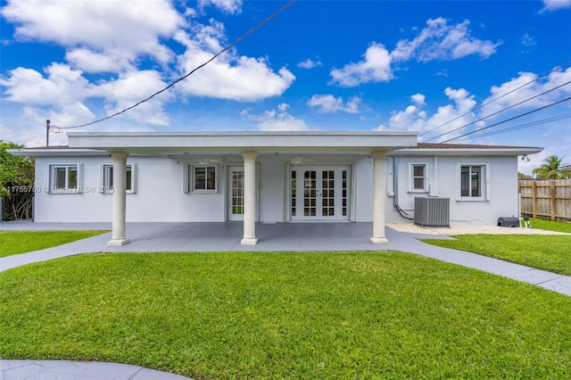 back of house featuring cooling unit, french doors, fence, and stucco siding