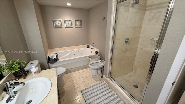 full bath featuring a stall shower, a jetted tub, toilet, and vanity