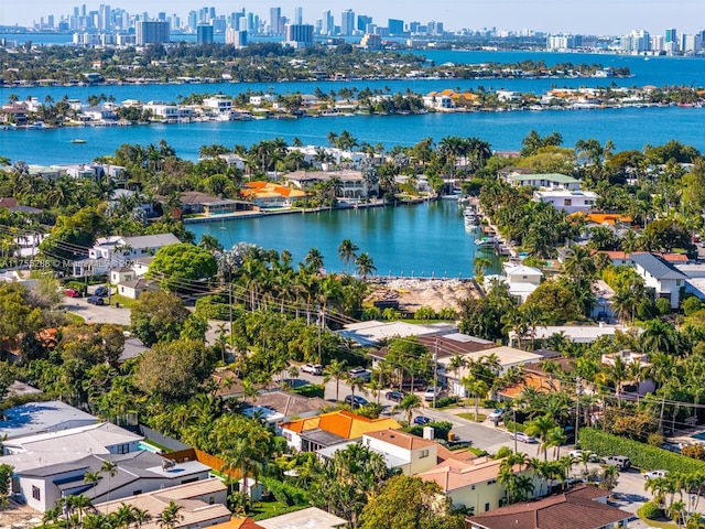 aerial view featuring a city view and a water view