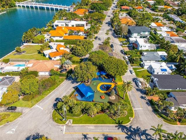 bird's eye view featuring a residential view and a water view