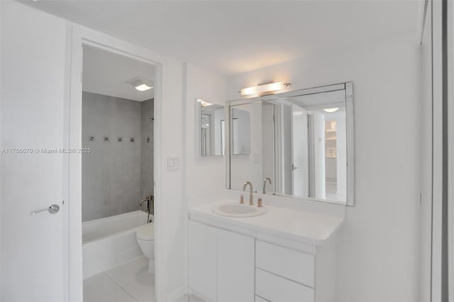 bathroom with toilet, tile patterned flooring, tub / shower combination, and vanity