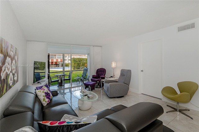 tiled living room with visible vents