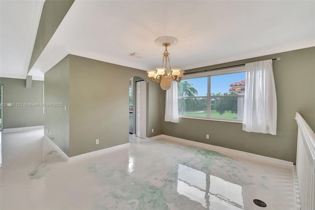 spare room featuring baseboards, arched walkways, ornamental molding, an inviting chandelier, and concrete floors