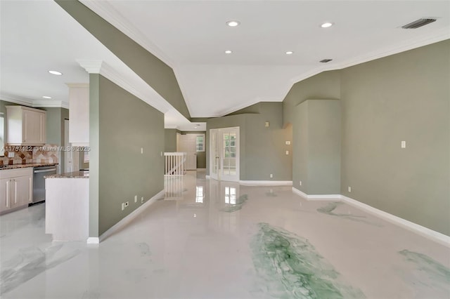 interior space with lofted ceiling, recessed lighting, visible vents, ornamental molding, and baseboards