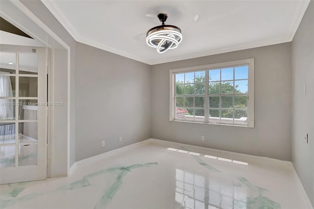 spare room featuring crown molding