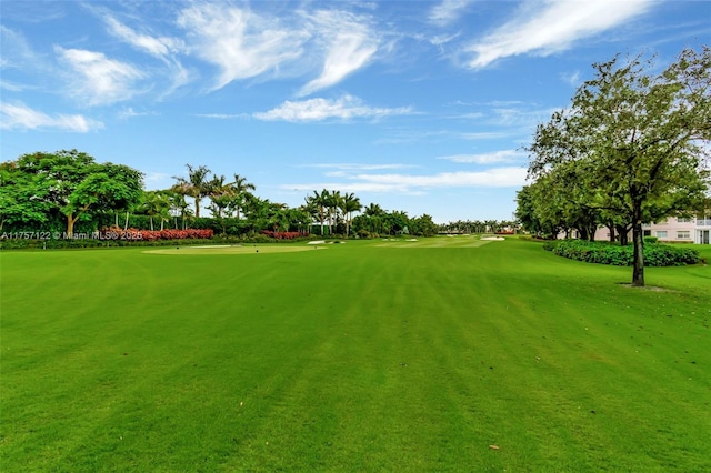 view of home's community featuring view of golf course