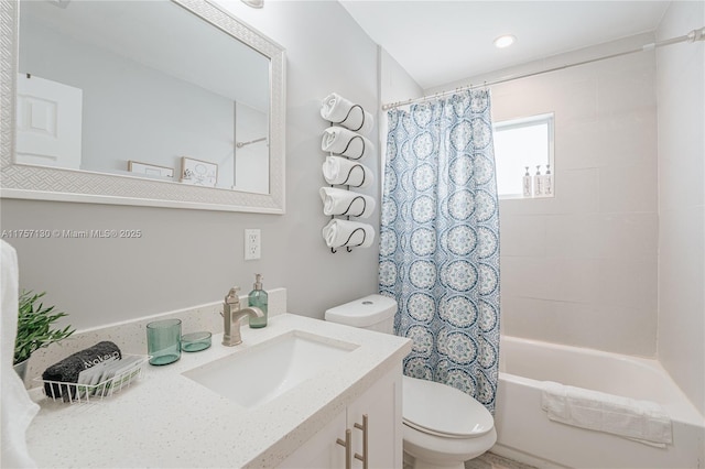 bathroom featuring vanity, toilet, and shower / tub combo with curtain