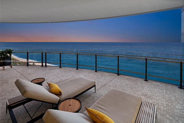 view of patio / terrace featuring a water view