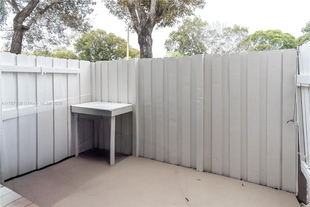 view of patio with fence