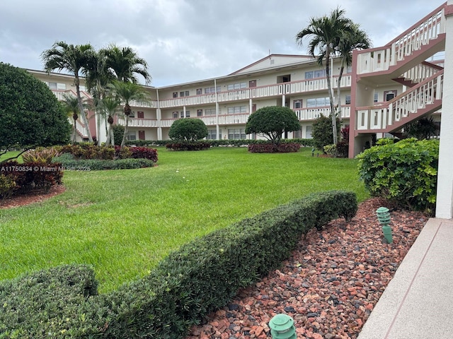 310 Preston H Unit 310, Boca Raton, FL 33434 - view of home's community featuring a lawn