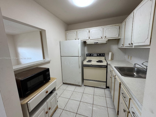 kitchen with under cabinet range hood, white appliances, a sink, white cabinetry, and light countertops