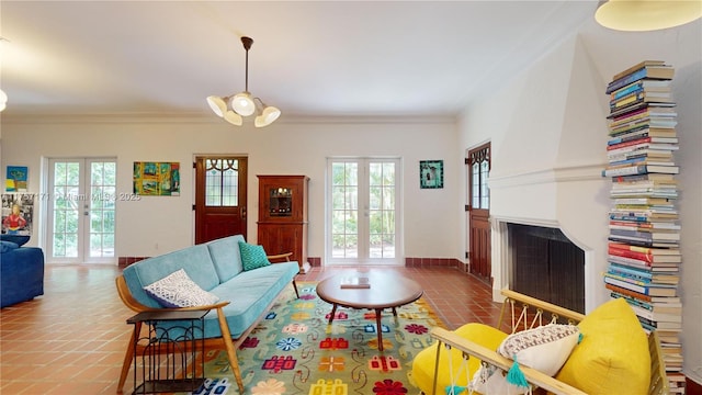 living room with ornamental molding, french doors, and plenty of natural light